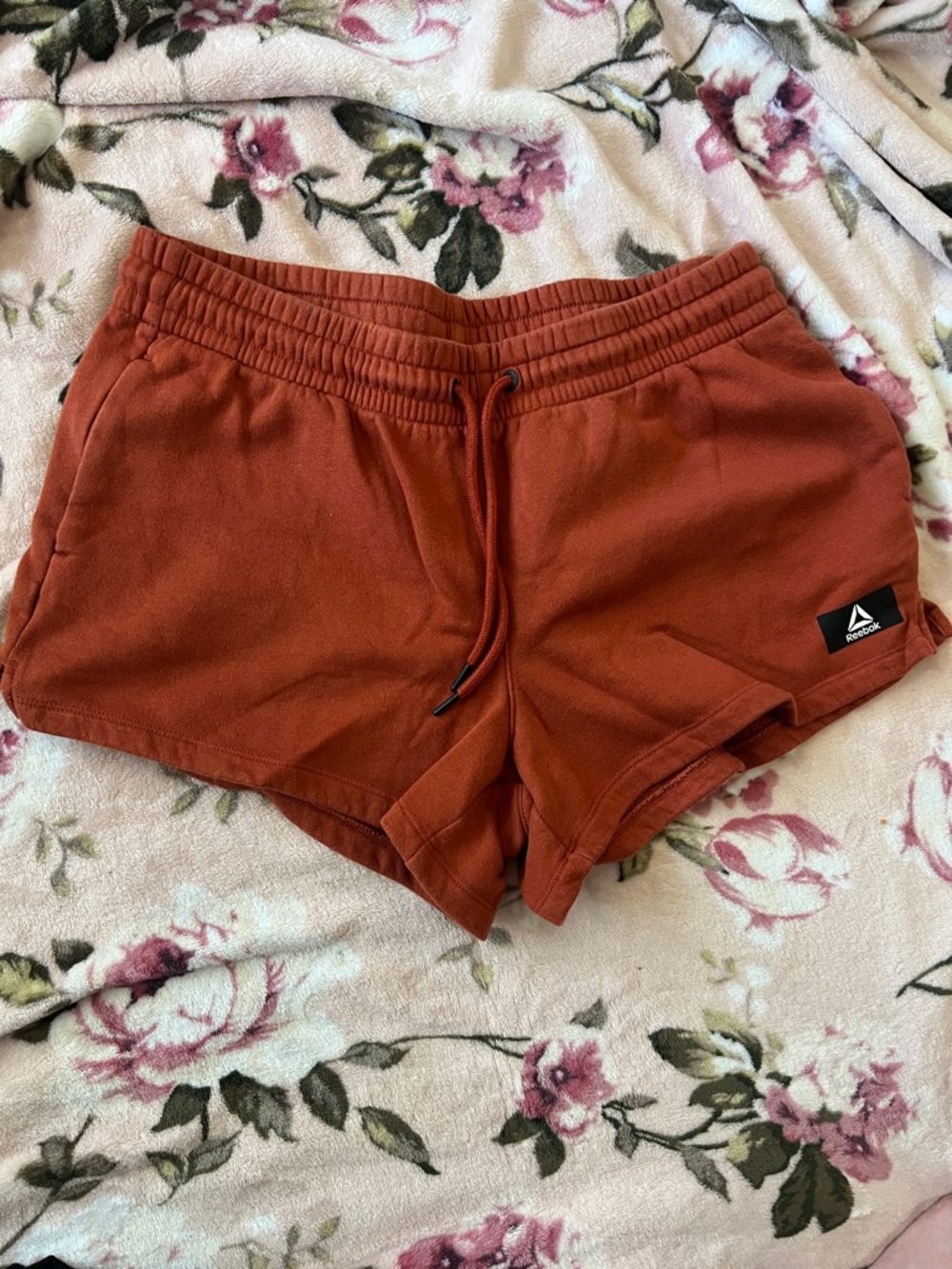 Reebok Women's Rust Orange Drawstring Athletic Shorts